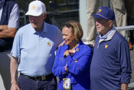 Former President's Bill Clinton, left, and George W. Bush pose for a photo with Charlotte Mayor Vi Lyles during a fourball match at the Presidents Cup golf tournament at the Quail Hollow Club, Friday, Sept. 23, 2022, in Charlotte, N.C. (AP Photo/Julio Cortez)