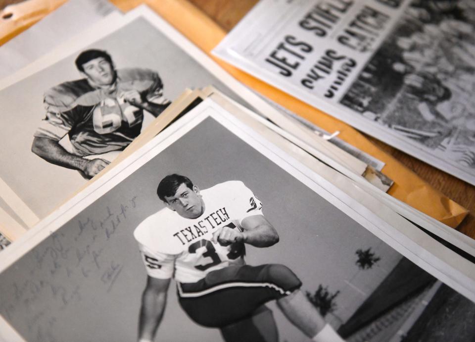 Lubbock resident Ed Mooney displays photos of himself from his days as a linebacker for Texas Tech, below, and for the Detroit Lions, above. Mooney grew up in New York and transferred to Texas Tech from a junior-college in Nebraska. He's been back in Lubbock since 1996.