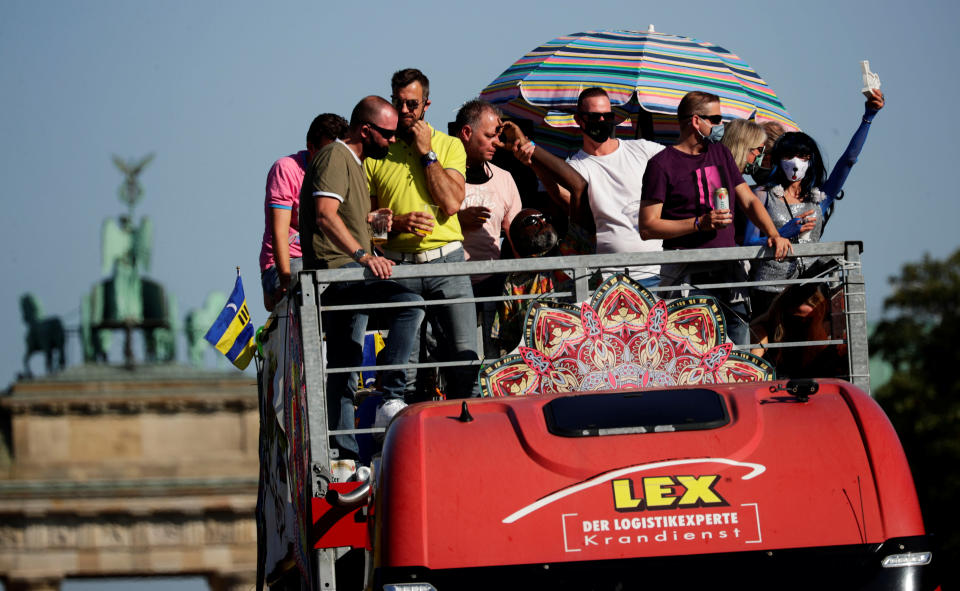 People attend a Love World Peace Parade from Brandenburg gate to Victory Column on the occasion of World Peace Day, amid the coronavirus disease (COVID-19) outbreak, in Berlin, Germany, September 21, 2020. REUTERS/Hannibal Hanschke