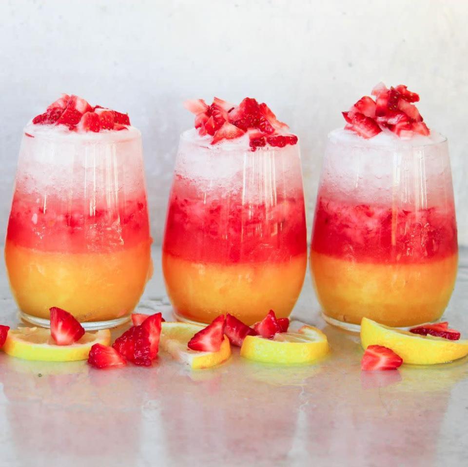 <p>Don't be fooled by it's pretty layers; this baby packs a punch. </p><p>Get the <a href="https://www.delish.com/uk/cocktails-drinks/a32182296/layered-lemonade-drops-recipe/" rel="nofollow noopener" target="_blank" data-ylk="slk:Spiked Ombre Lemonade" class="link ">Spiked Ombre Lemonade</a> recipe.</p>