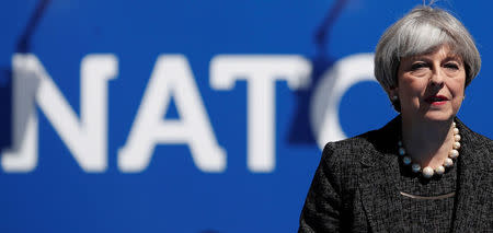 Britain’s Prime Minister Theresa May arrives to attend the NATO Summit at their new headquarters in Brussels, Belgium, May 25, 2017. REUTERS/Christian Hartmann