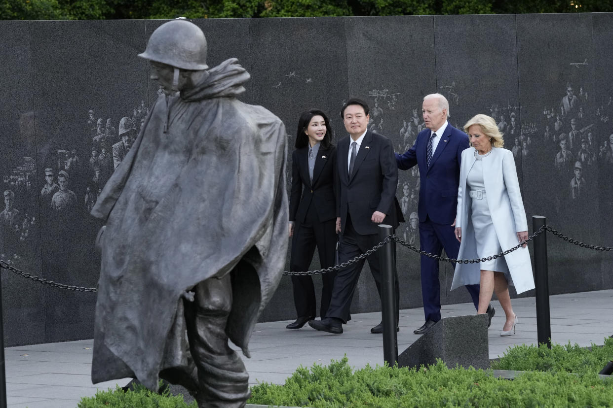 President Joe Biden, first lady Jill Biden, South Korea's President Yoon Suk Yeol and his wife Kim Keon Hee visit the Korean War Veterans Memorial in Washington, Tuesday, April 25, 2023. (AP Photo/Susan Walsh)