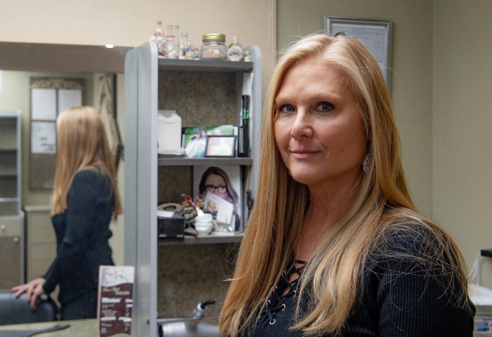 Ithaca business owner Joyce Millington in her salon, Shear Style. Millington mistakingly received a $68,000 utility bill, but was able to resolve the issue with a phone call to NYSEG. February 2, 2023. 