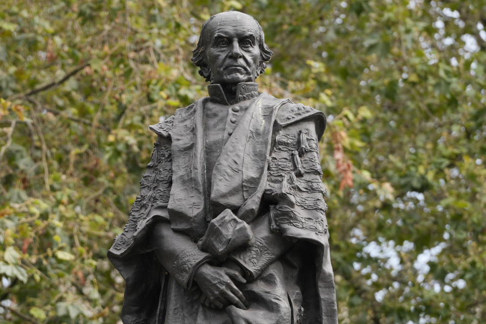 The Gladstone Memorial, a statue of former British Prime Minister William Gladstone, the son of sugar and coffee plantation owner John Gladstone, in London, Friday, Aug. 25, 2023. Guyana president Irfaan Ali has lashed out at the descendants of European slave traders and says those who profited from the cruel, trans-Atlantic slave trade should offer to pay reparations to today's generations. Ali spoke ahead of Friday's planned formal apology in Guyana by the descendants of Scottish 19th-century sugar and coffee plantation owner John Gladstone. He said the apology should also include issues of compensation and reparative justice. (AP Photo/Kirsty Wigglesworth)