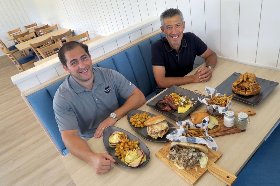 Brian Neiman (left) and Bruce Fischer are shown in the dining room of their new restaurant, Pop's Corner, in Point Pleasant Beach.