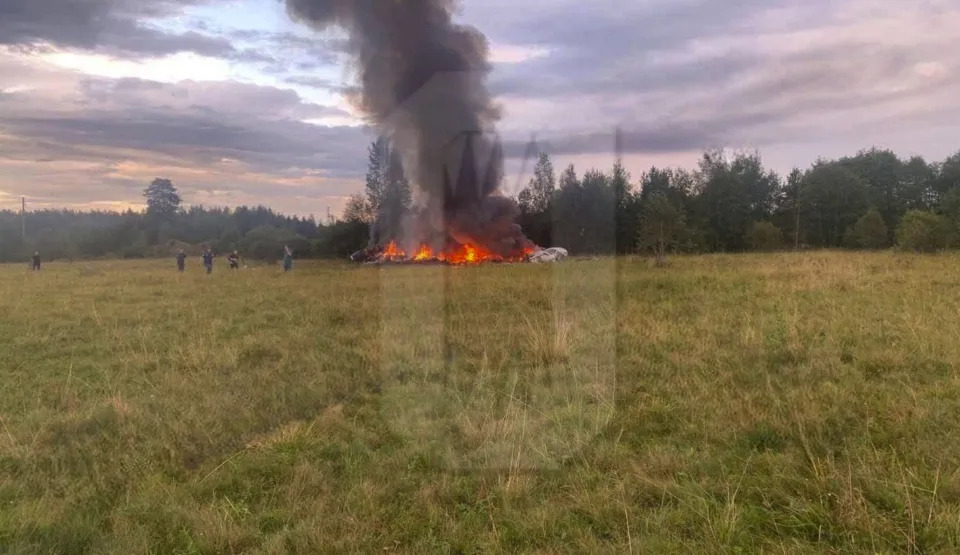 This image released by Ostorozhno Novosti on Wednesday, Aug. 23, 2023, shows the crash site of a private jet near the village of Kuzhenkino, Tver Region. Officials say a private jet has crashed over Russia, killing all 10 people on board. Mercenary chief Yevgeny Prigozhin was on the passenger list, but it wasn't immediately clear if he was on board. (Ostorozhno Novosti via AP)