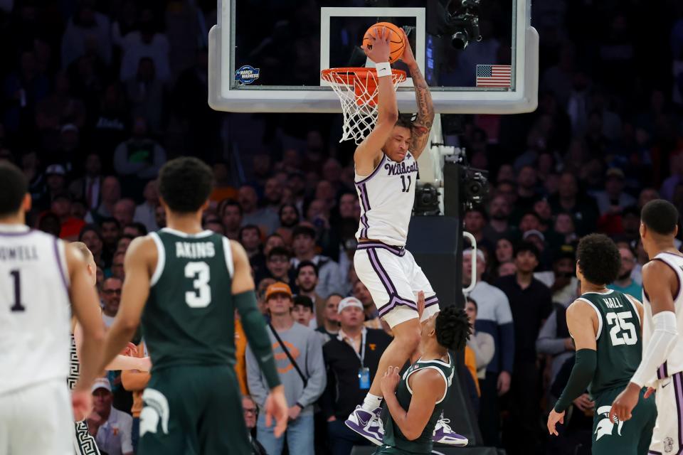 Kansas State's Keyontae Johnson throws down an alley oop in overtime against Michigan State.