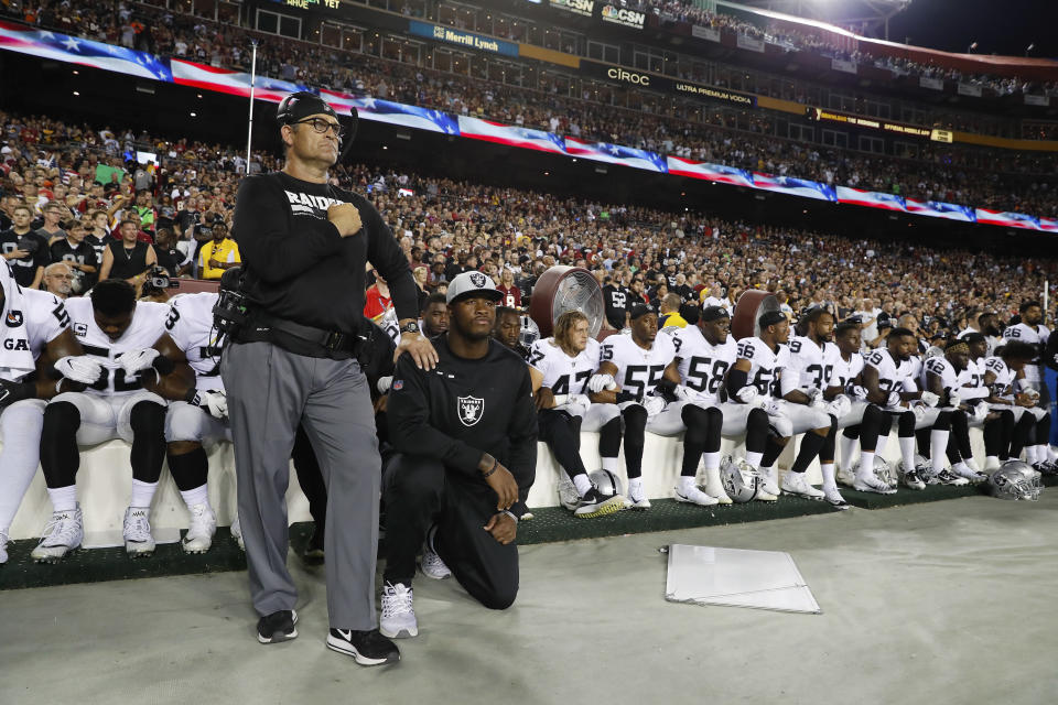 The Oakland Raiders hadn’t planned on coming out for the national anthem. (AP Photo/Alex Brandon)