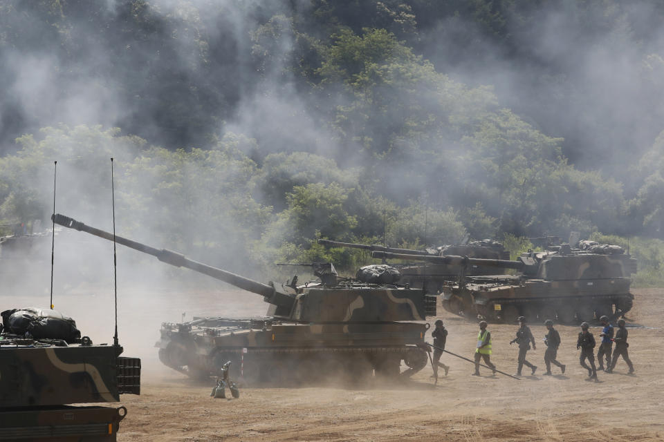 South Korean army solders move after their K-9 self-propelled howitzers firing during the annual exercise in Paju, South Korea, near the border with North Korea, Tuesday, June 23, 2020. A South Korean activist said Tuesday hundreds of thousands of leaflets had been launched by balloons across the border with North Korea overnight, after the North repeatedly warned it would retaliate against such actions. (AP Photo/Ahn Young-joon)