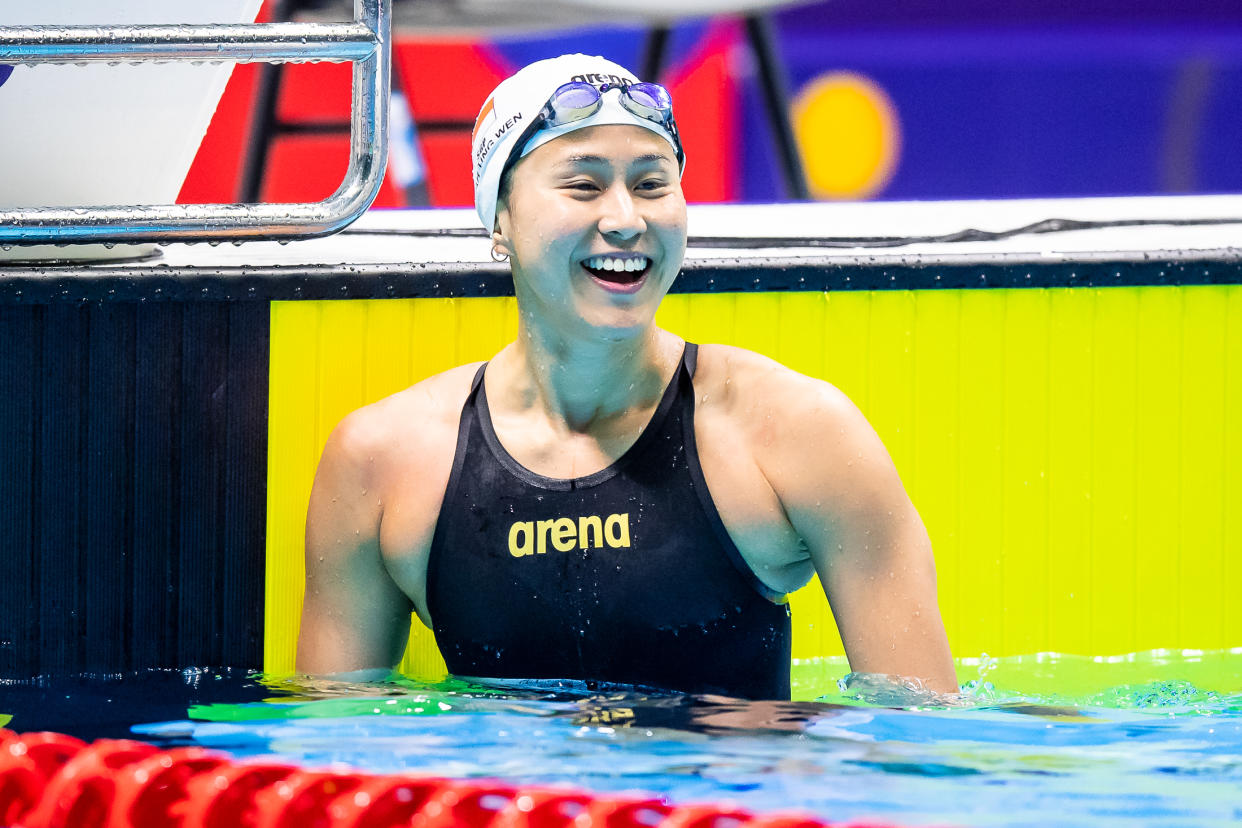 Singapore swimmer Quah Ting Wen smiles after winning gold in the women's 50m butterfly. (PHOTO SNOC/Andy Chua)