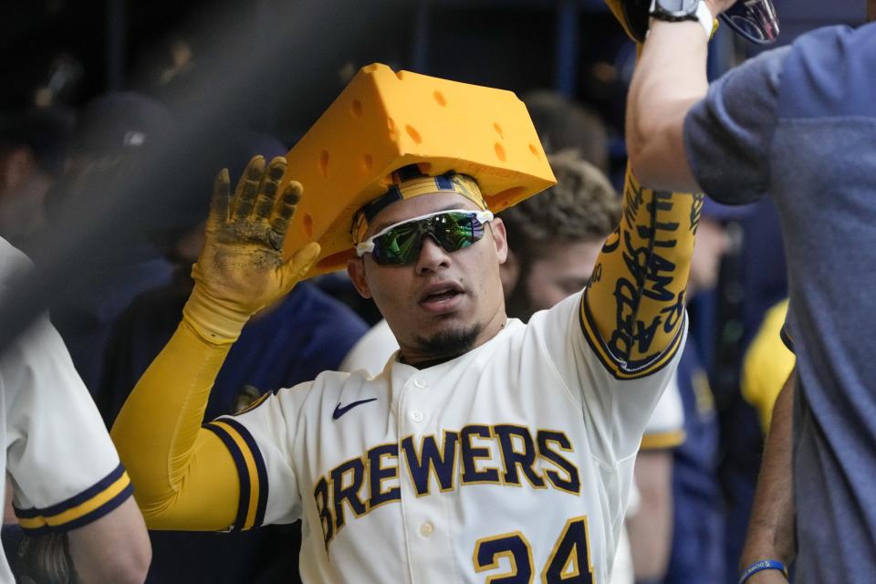 Milwaukee Brewers' William Contreras celebrates after hitting a home run during the fourth inning of a baseball game against the Los Angeles Dodgers Wednesday, May 10, 2023, in Milwaukee. (AP Photo/Morry Gash)