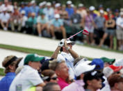 Bubba Watson tees off on the third hole during the fourth round of the Masters golf tournament Sunday, April 13, 2014, in Augusta, Ga. (AP Photo/Matt Slocum)