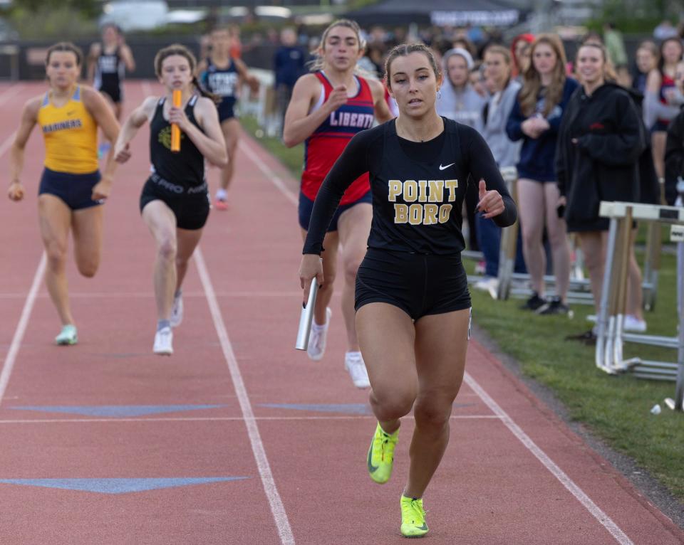 Point Pleasant Borough's Annabella Ryan runs anchor leg of her team’s winning 4X200 race. Ocean County Track and Field Relays in Stafford Township on May 5, 2023.