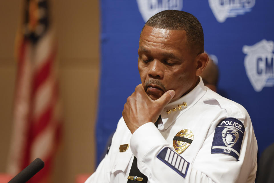 Charlotte-Mecklenburg Police Chief Johnny Jennings pauses at a press conference in Charlotte, N.C., Tuesday, April 30, 2024, regarding the shooting of four officers during an attempt to serve a warrant on April 29, 2024. (AP Photo/Nell Redmond)