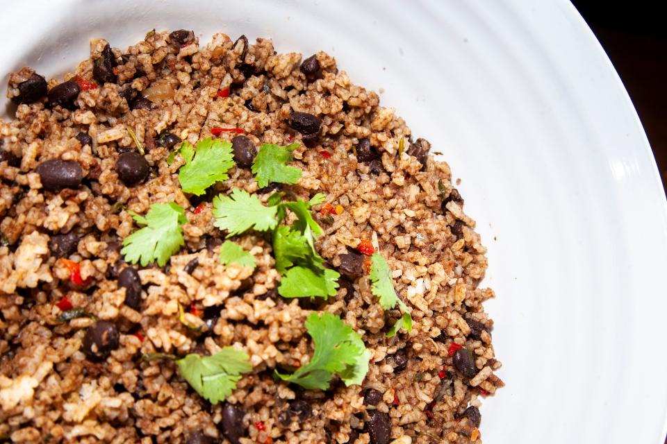 Gallo pinto topped with cilantro made by entertainment reporter Paris Barraza is seen Nov. 16 at the Press-Citizen office.