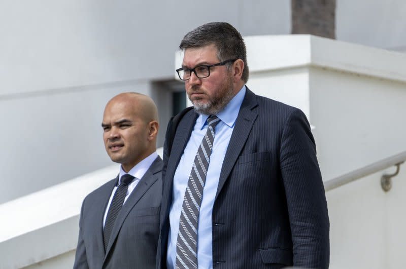 Walt Nauta (L), an aide to former U.S. President Donald Trump, is seen leaving the Alto Lee Adams Sr. U.S. federal courthouse in Fort Pierce, Fla., on Thursday. Photo by Gary I. Rothstein/UPI