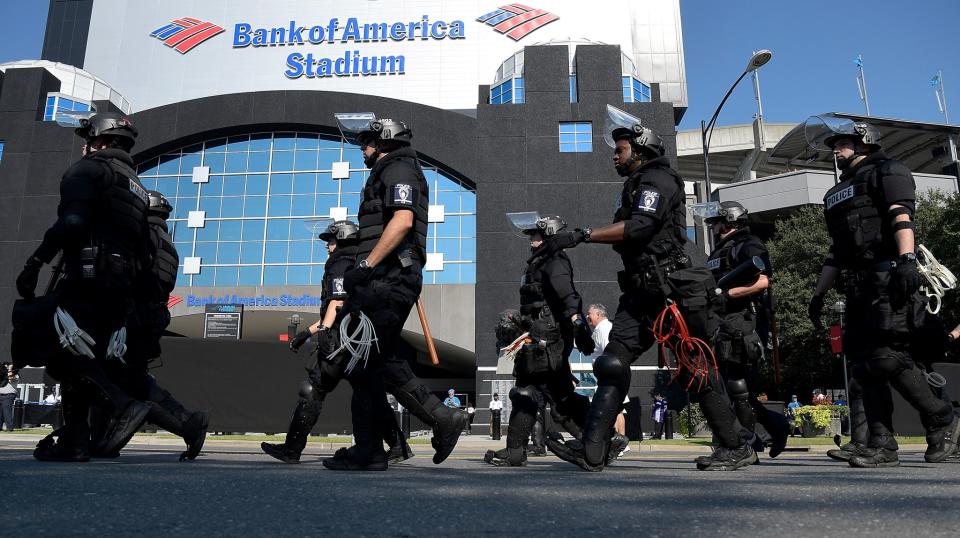 <p>Charlotte Mecklenburg Police Department deploy outside of Bank of America Stadium prior to the game between the Carolina Panthers and the Minnesota Vikings on September 25, 2016 in Charlotte, North Carolina. Charlotte has been the site of civil unrest since Keith Lamont Scott, 43, was shot and killed by police officers at an apartment complex near UNC Charlotte on September 25, 2016. (Photo by Grant Halverson/Getty Images) </p>