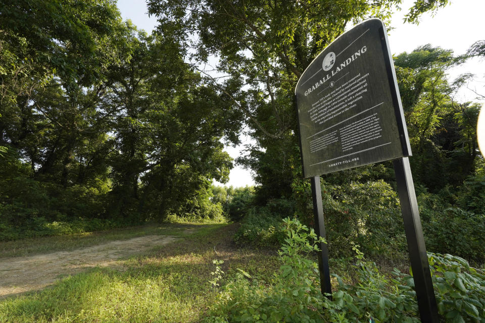 A memorial sign at Graball Landing, the spot where Emmett Till's body was pulled from the Tallahatchie River just outside of Glendora, Miss., is photographed Monday, July 24, 2023. President Joe Biden is expected to create a national monument honoring Till, the Black teenager from Chicago who was abducted, tortured and killed in 1955 in Mississippi, and his mother Mamie Till-Mobley. Altogether, the Till national monument will include 5.7 acres of land and two historic buildings. The Mississippi sites are Graball Landing and the Tallahatchie County Second District Courthouse, where Emmett’s killers were tried. (AP Photo/Rogelio V. Solis)