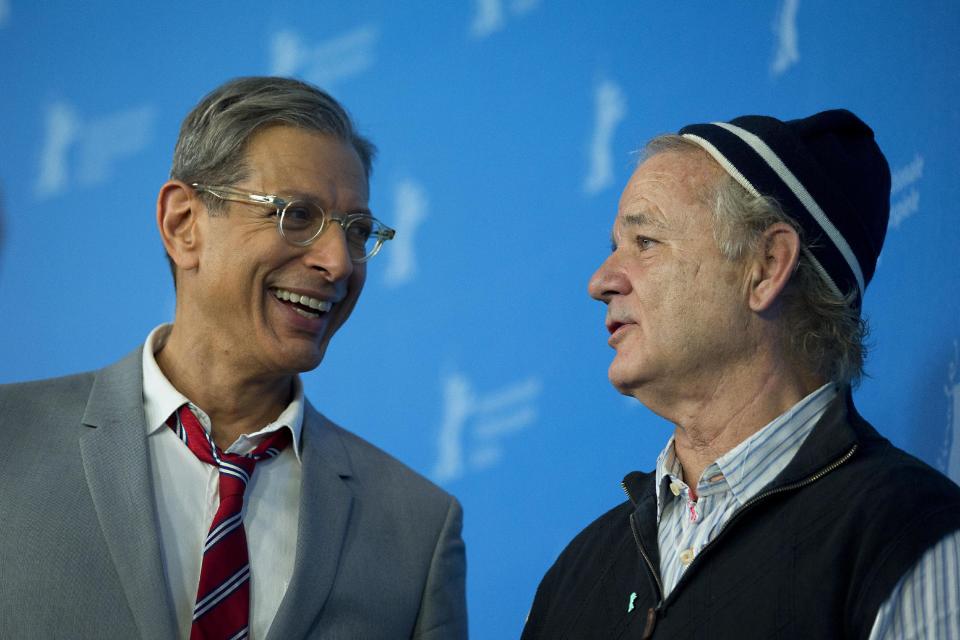 Actors Jeff Goldblum and Bill Murray speak to each other at the photo call for the film The Grand Budapest Hotel during the International Film Festival Berlinale, in Berlin, Thursday, Feb. 6, 2014. (AP Photo/Axel Schmidt)