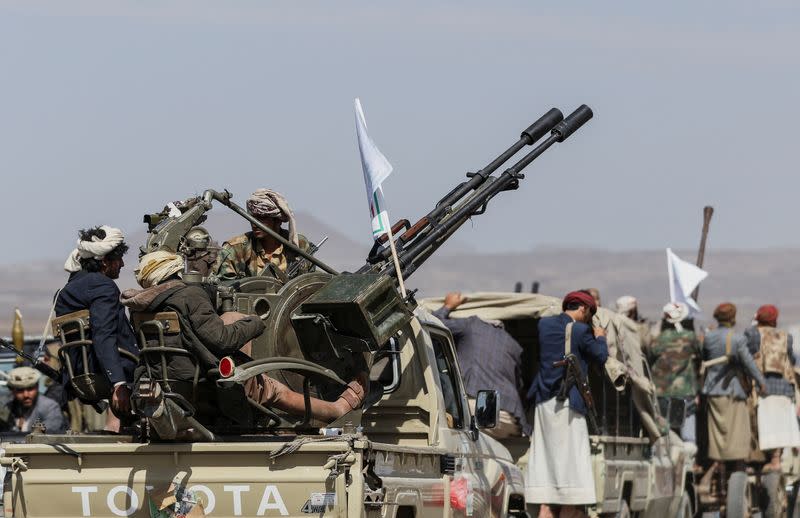 Houthi tribesmen gather to show defiance after U.S. and U.K air strikes on Houthi positions near Sanaa