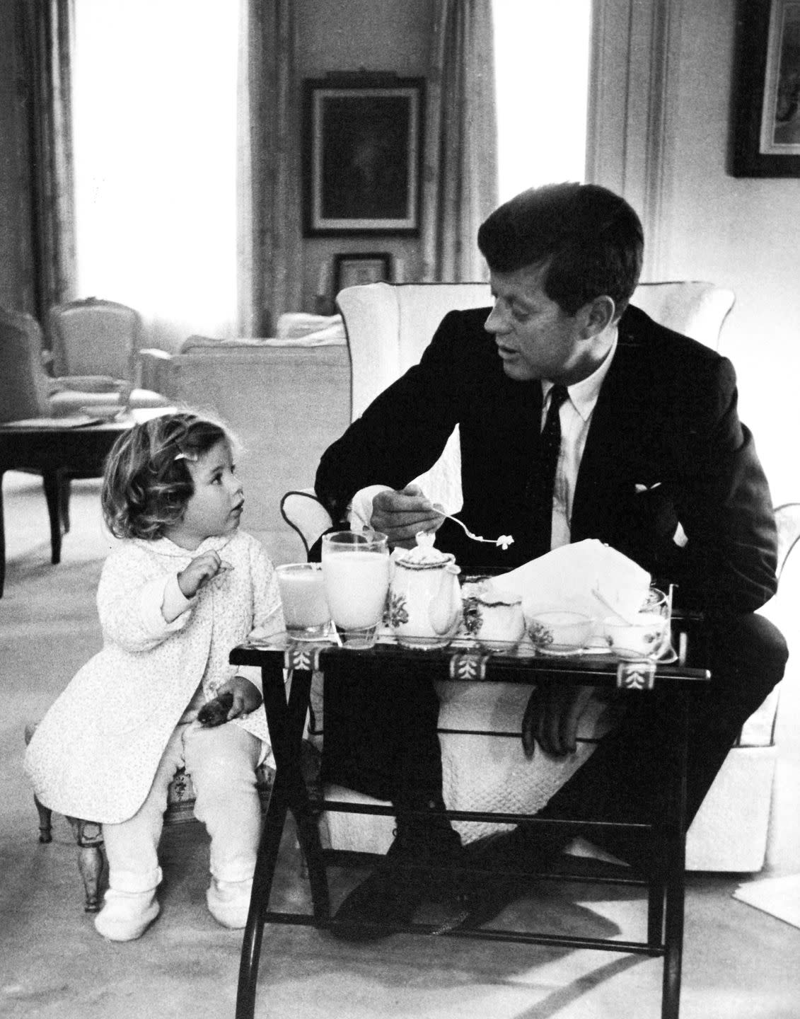 us president john f kennedy and daughter caroline at breakfast