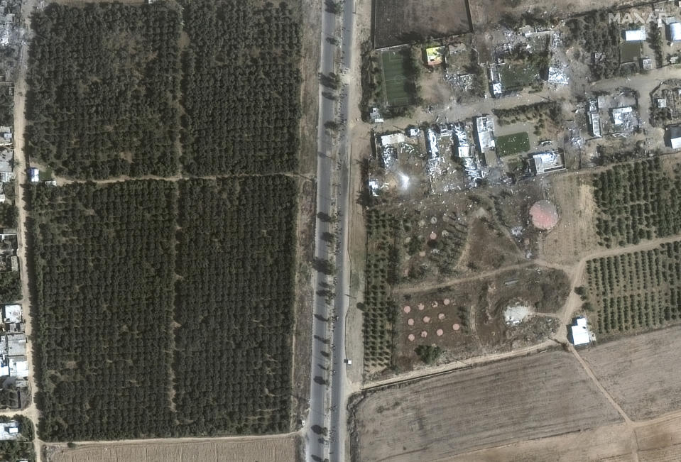 This image provided by Maxar Technologies shows an overview of groups of people evacuating south from Gaza City, along Salah al-Din Road as part of the humanitarian corridor that was opened briefly today to enable civilians an opportunity to flee the fighting, in Gaza, Tuesday, Nov. 7, 2023. (Satellite image ©2023 Maxar Technologies via AP)