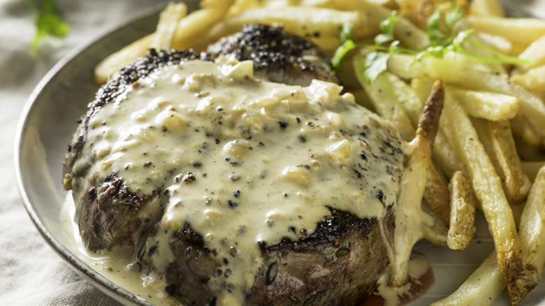 steak with pepper sauce, fries