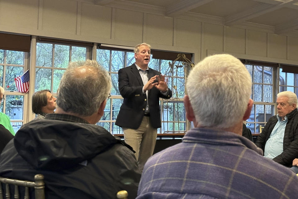 FILE - Republican House candidate Mark Houck speaks to a meeting of Republicans April 17, 2024, in New Hope, Pa. Houck's campaign to unseat Republican Rep. Brian Fitzpatrick in Pennsylvania's GOP primary could offer hints about swing-district party sentiment in a heated presidential election year. The congressional district in suburban Philadelphia is one of 16 nationwide that Democrat Joe Biden carried in 2020 where voters also sent Republicans to Washington. The Republicans' House majority is so slim that Democrats need to flip just four seats to retake control. (AP photo/Mike Catalini, File)