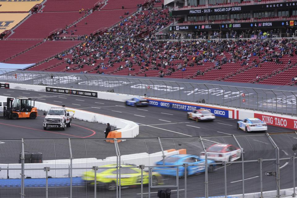 Drivers race during qualifying heats for the Busch Light Clash NASCAR exhibition auto race at Los Angeles Memorial Coliseum Saturday, Feb. 3, 2024, in Los Angeles. (AP Photo/Mark J. Terrill)