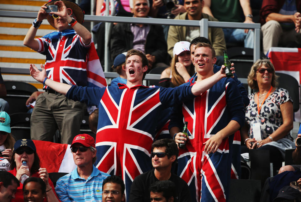 LONDON, ENGLAND - AUGUST 01: Fans of Great Britain show their support during the Men's preliminary Hockey match between Great Britain and South Africa on Day 5 of the London 2012 Olympic Games at Riverbank Arena on August 1, 2012 in London, England. (Photo by Daniel Berehulak/Getty Images)