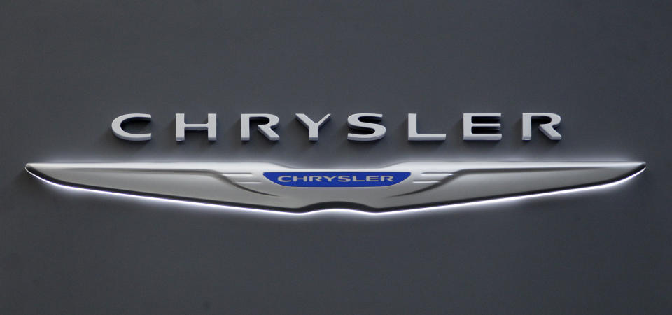 This Feb. 16, 2012 photo shows Chrysler logo on the Chrysler exhibit at the 2012 Pittsburgh Auto Show. Chrysler says its U.S. sales rose 30 percent and sold more than 150,000 vehicles in May, compared with 115,000 in the same month a year ago. (AP Photo/Gene J. Puskar, File)