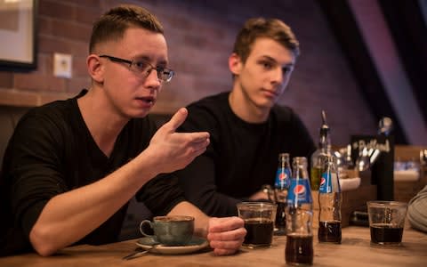 Sober Russia activists Dmitry Petrov and Maxim Solovyov at a local pizza restaurant in Veliky Novgorod - Credit: Dmitri Beliakov/For The Telegraph