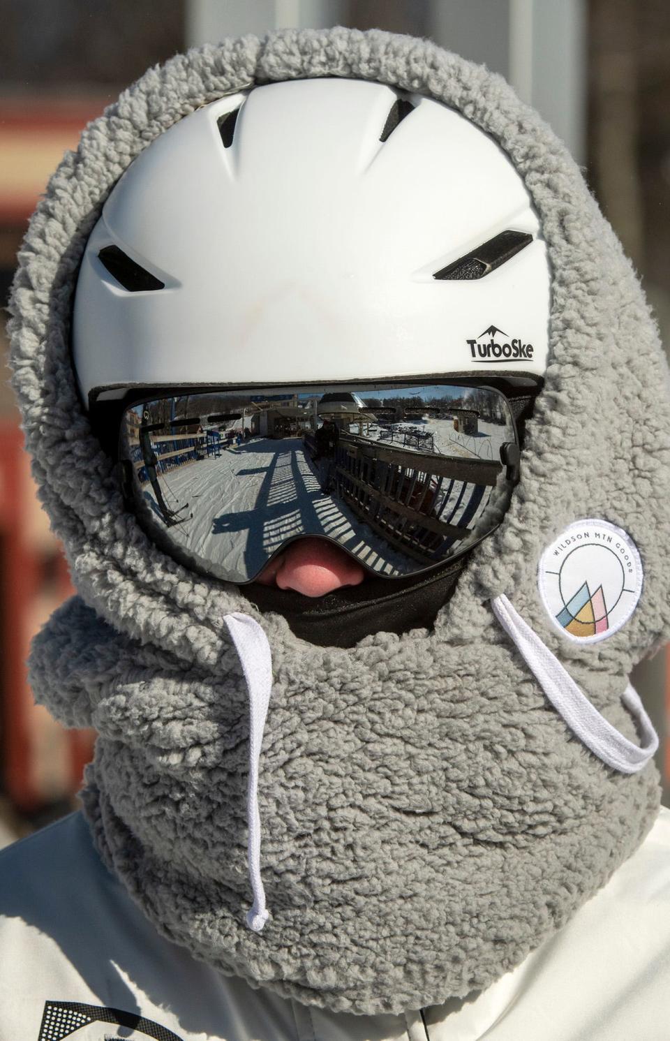 WESTMINSTER - Skier Molly Girotti, 12, is bundled against the cold wind as she gets in a lift line at Wachusett Mountain Ski Area Friday February 3, 2023. 