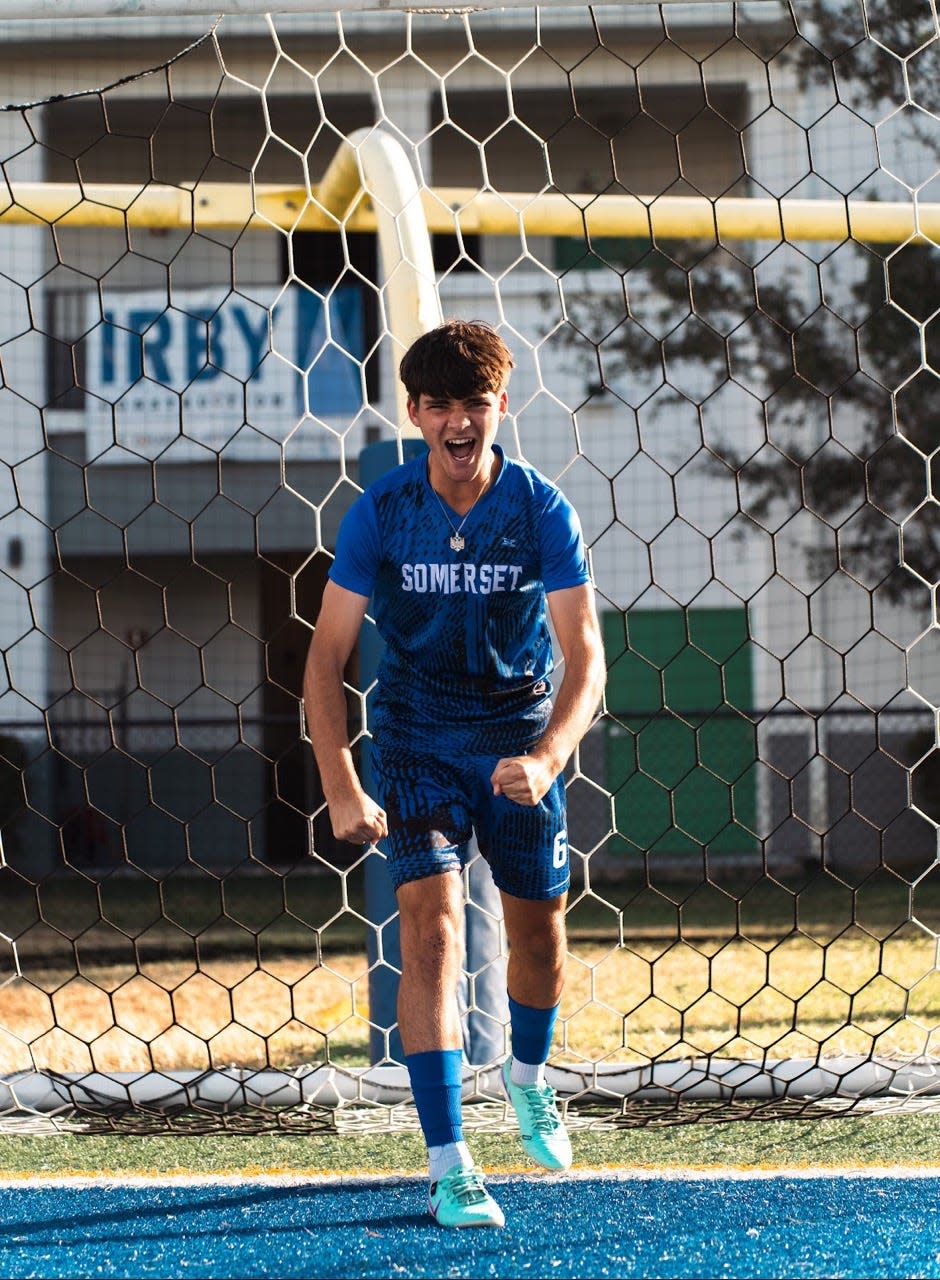 Somerset-Canyons' Edon Zharku poses during the Cougars' media day