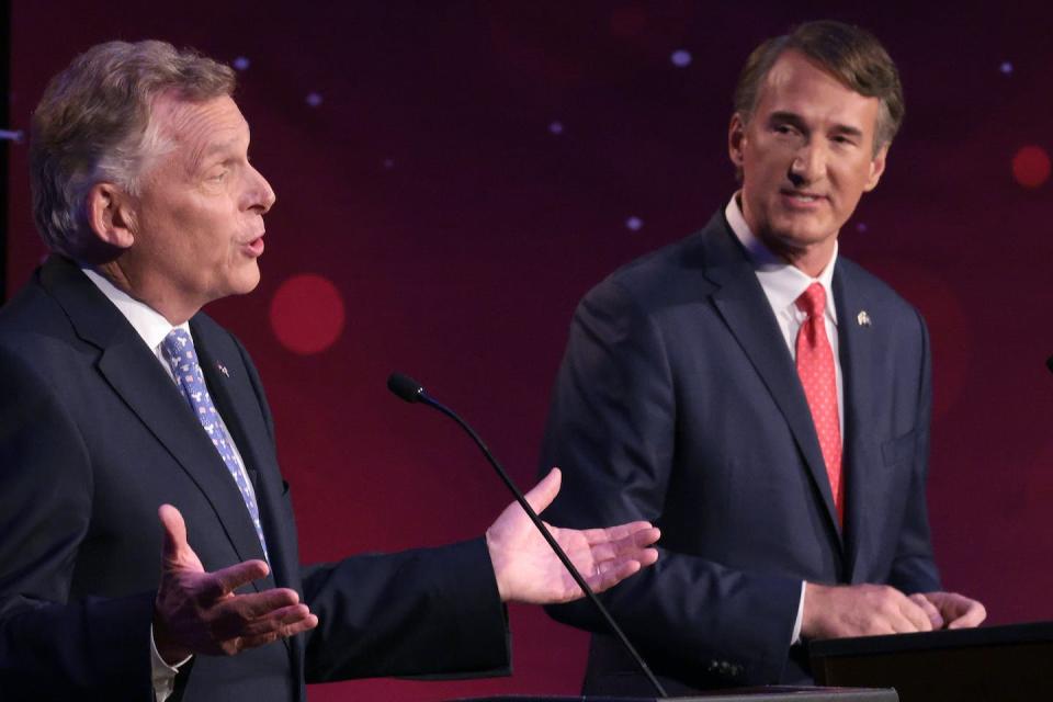 Candidate and former Democratic Virginia Gov. Terry McAuliffe, left, debates Republican gubernatorial candidate Glenn Youngkin on Sept. 28, 2021. <a href="https://www.gettyimages.com/detail/news-photo/former-virginia-gov-terry-mcauliffe-debates-republican-news-photo/1343654379?adppopup=true" rel="nofollow noopener" target="_blank" data-ylk="slk:Win McNamee/Getty Images;elm:context_link;itc:0;sec:content-canvas" class="link ">Win McNamee/Getty Images</a>