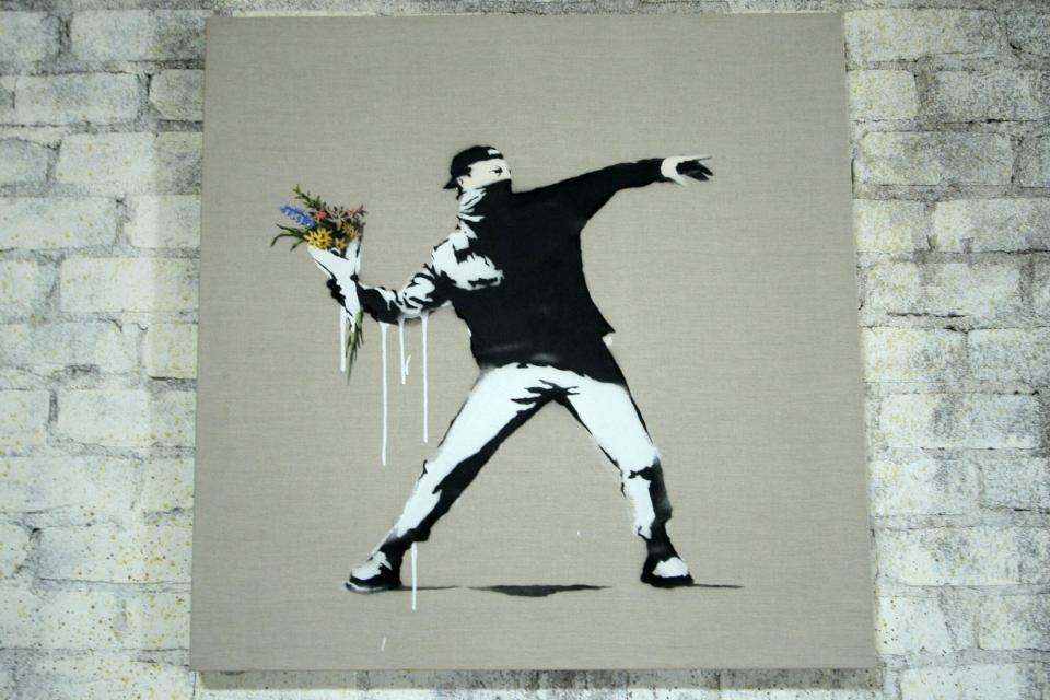 Artwork by Banksy (Photo by Rebecca Sapp/WireImage)