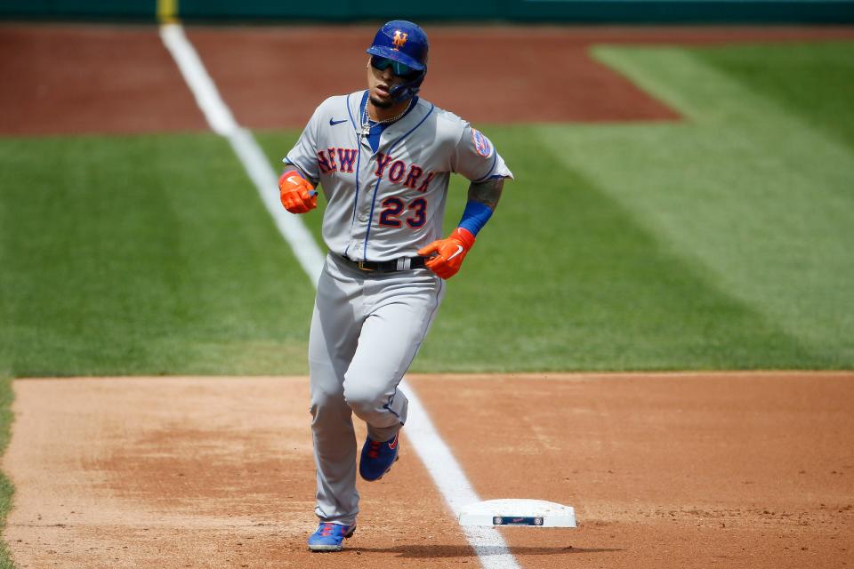 Sep 4, 2021; Washington, District of Columbia, USA; New York Mets second baseman Javier Baez (23) rounds third base after hitting a home run against the Washington Nationals in the second inning at Nationals Park.