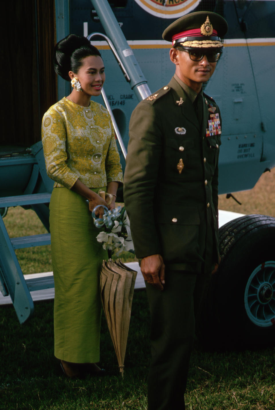 King Rama IX and Queen Sirikit have arrived to visit the victims of a recent flood in Hat Yai, Thailand. (Photo by Dean Conger/Corbis via Getty Images)