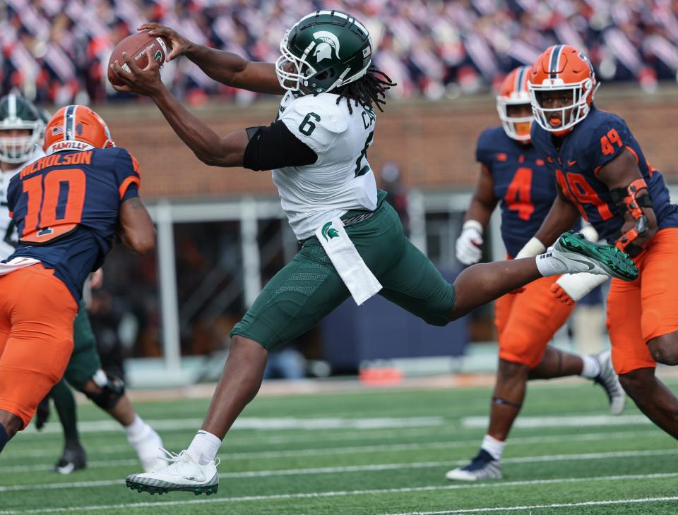 Maliq Carr (6) of the Michigan State Spartans attempts to catch the ball during the first half against the Illinois Fighting Illini at Memorial Stadium on November 5, 2022 in Champaign, Illinois.