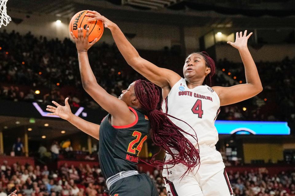 South Carolina forward Aliyah Boston (4) blocks a shot by Maryland guard Bri McDaniel (24) during their Elite Eight game.