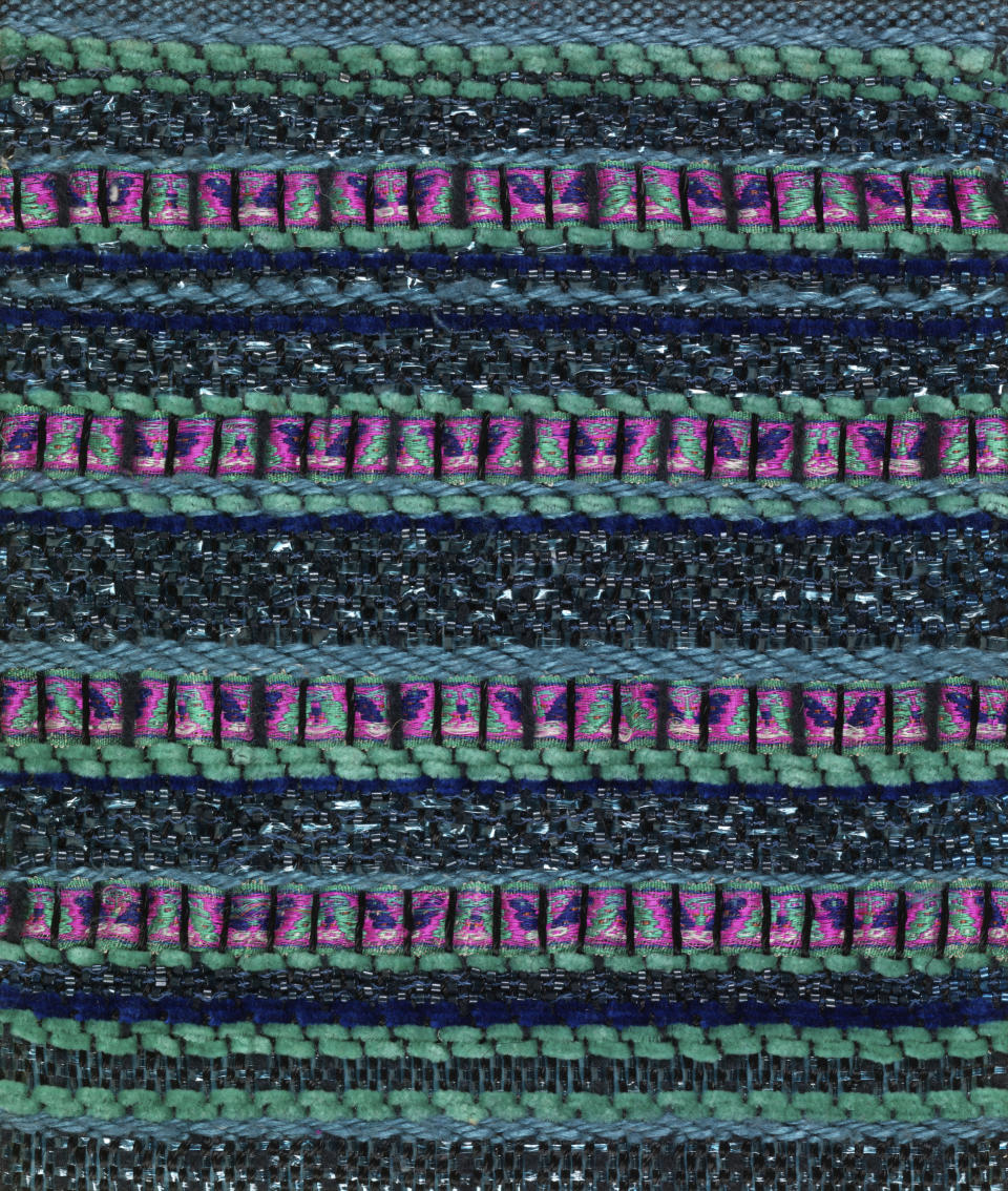 This image released by the Cooper Hewitt Smithsonian Design Museum shows a textile sample card, "Chinese Ribbons," designed by Dorothy Wright Liebes. An exhibit of her work, “A Dark, a Light, a Bright: The Designs of Dorothy Liebes,” runs through Feb. 4, at the Cooper Hewitt Smithsonian Design Museum in New York Liebes, who died in 1972, helped define the look and feel of 20th century luxury, from first-class airline seats to movie backdrops, hotel suites to bathing suits, metallic wallpaper to car upholstery. (Matt Flynn/Cooper Hewitt Smithsonian Design Museum via AP)