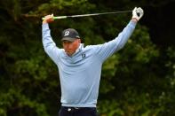 Jul 21, 2017; Southport, ENG; Matt Kuchar stretches on the fifth tee box during the second round of The 146th Open Championship golf tournament at Royal Birkdale Golf Club. Mandatory Credit: Steve Flynn-USA TODAY Sports