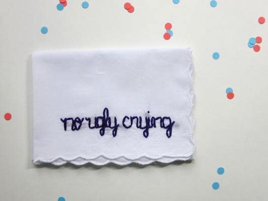 <i>Buy it from <a href="https://wrenbirdarts.com/collections/wedding/products/wedding-bridesmaid-no-ugly-crying-funny-handkerchief" target="_blank">WrenBirdArts</a>&nbsp;for&nbsp;$18.</i>