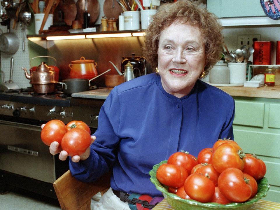 julia child holding tomatoes