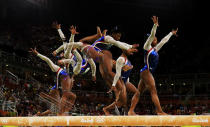 Simone Biles in action on the balance beam.