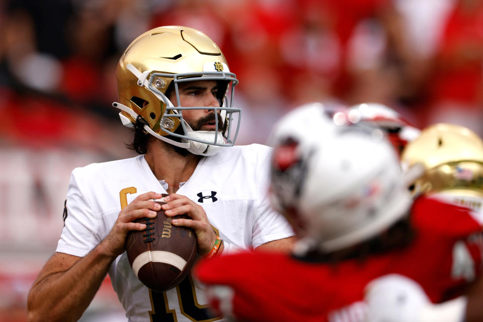 Notre Dame quarterback Sam Hartman led the way in a gritty road victory over NC State on Saturday in Raleigh, North Carolina. (Photo by Lance King/Getty Images)