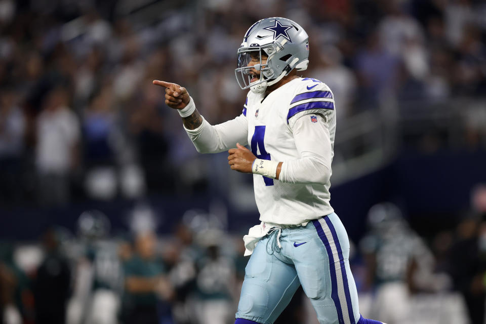 ARLINGTON, TEXAS - SEPTEMBER 27: Dak Prescott #4 of the Dallas Cowboys reacts to a first quarter pass while playing the Philadelphia Eagles at AT&T Stadium on September 27, 2021 in Arlington, Texas. (Photo by Tom Pennington/Getty Images)