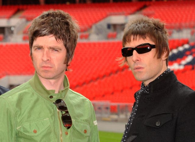 Oasis band members Noel (left) and Liam Gallagher during a photocall at Wembley Stadium in 2008 