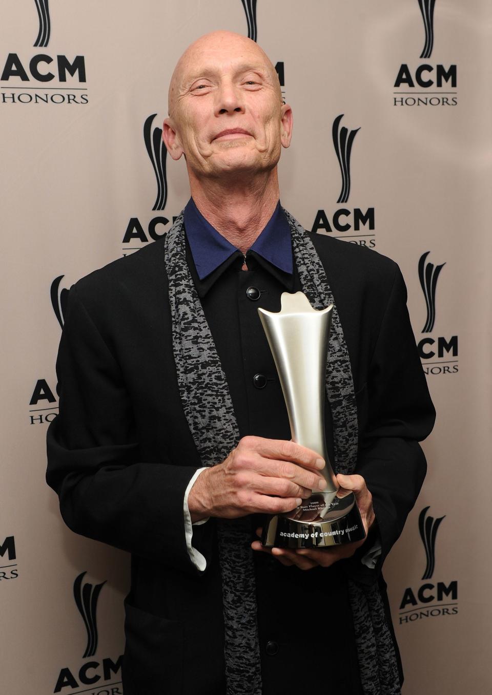 Top Bass Player of the Year Michael Rhodes poses backstage during the 4th Annual ACM Honors at the Ryman Auditorium on September 20, 2010 in Nashville, Tennessee.