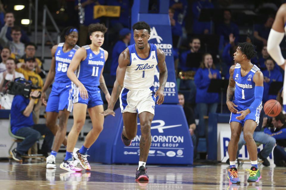 Tulsa forward Martins Igbanu (1) celebrates after scoring in the first half of an NCAA college basketball game against Memphis in Tulsa, Okla., Wednesday, Jan. 22, 2020. (AP Photo/Joey Johnson)